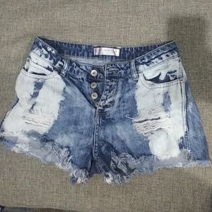 Bleached, distressed jean shorts